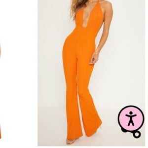 PRETTYLITTLETHING Orange Flared Jumpsuit. Size US12 (UK16).